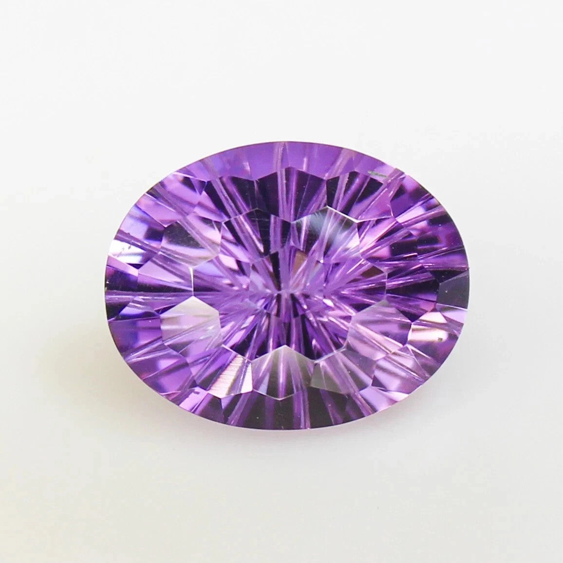 Natural Faceted Purple Amethyst In Football Cut 19.54 Carats Oval Certified gems