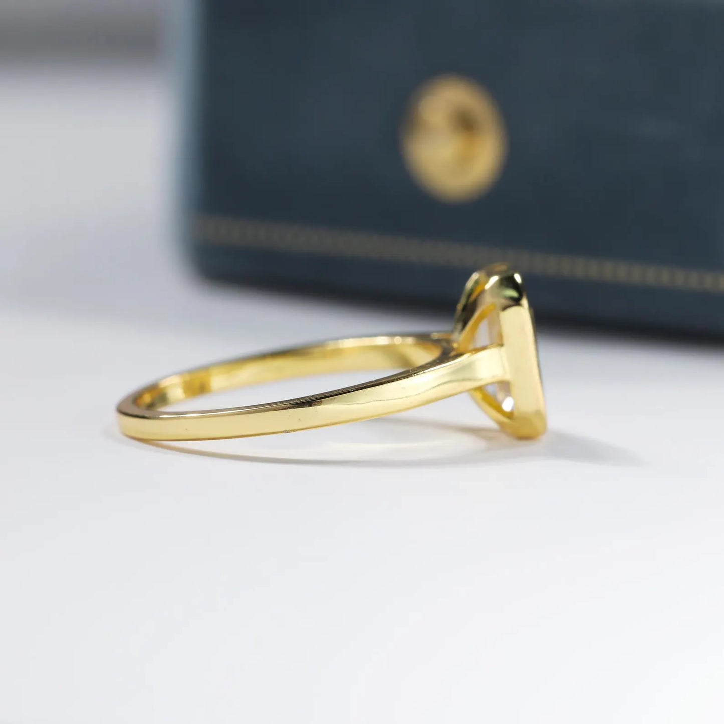 Emerald Cut Simulated Diamond Ring: 14k Gold Plated Sterling Silver Bezel Setting