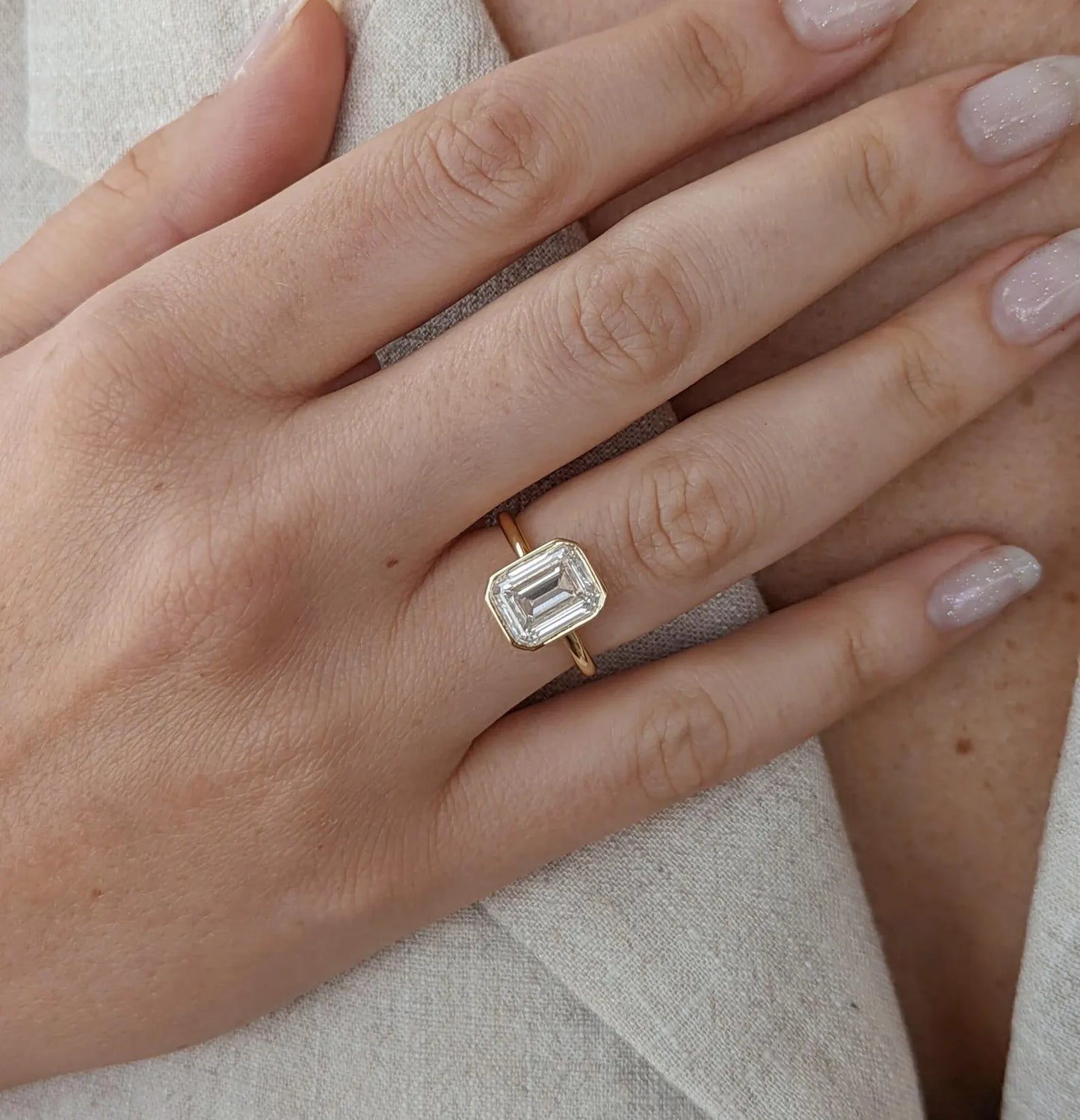 Emerald Cut Simulated Diamond Ring: 14k Gold Plated Sterling Silver Bezel Setting